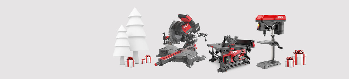 A selection of SKIL benchtop power tools surrounded by holiday gifts with a stylized white tree in the background