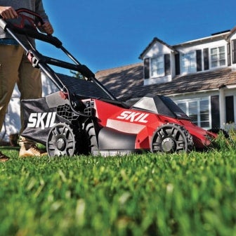 Man using a PWR CORE 40™ lawn mower